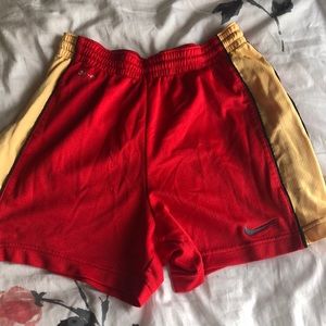 Dri-fit red and yellow Nike shorts